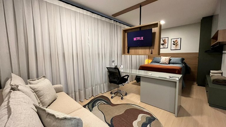 Studio sofisticado no Centro com vaga de garagem