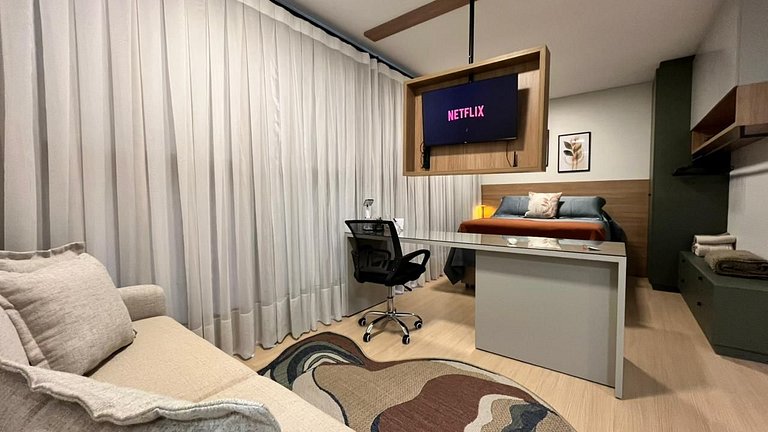 Studio sofisticado no Centro com vaga de garagem