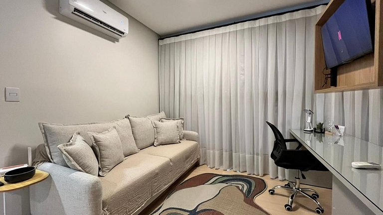 Studio sofisticado no Centro com vaga de garagem