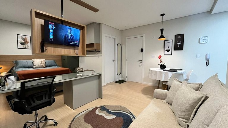 Studio sofisticado no Centro com vaga de garagem