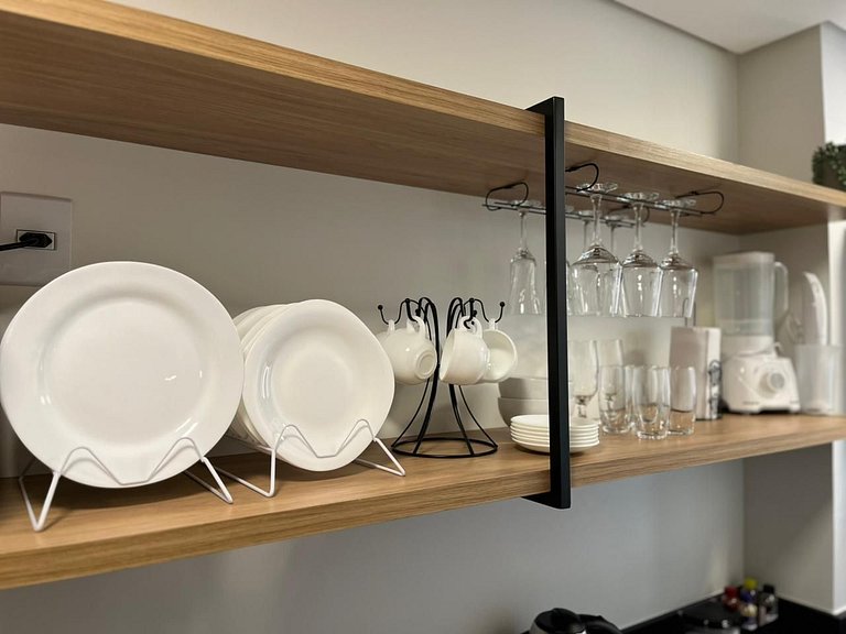 Studio sofisticado no Centro com vaga de garagem