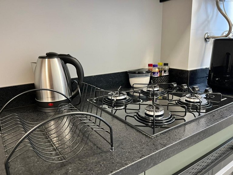 Studio sofisticado no Centro com vaga de garagem