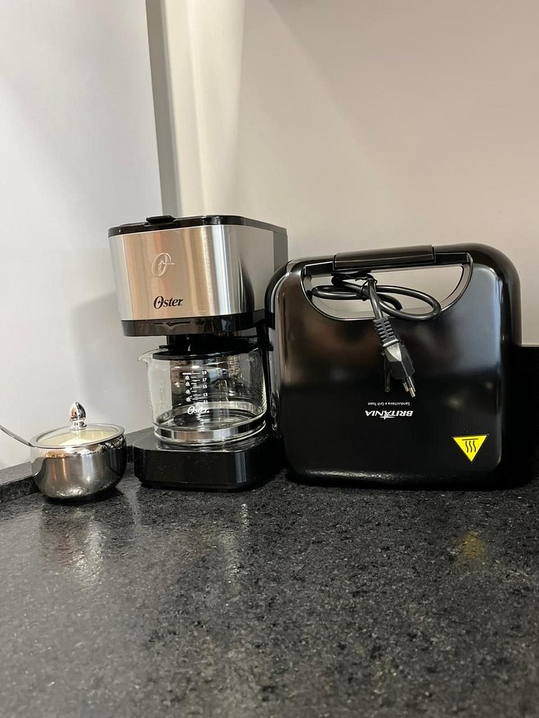 Studio sofisticado no Centro com vaga de garagem